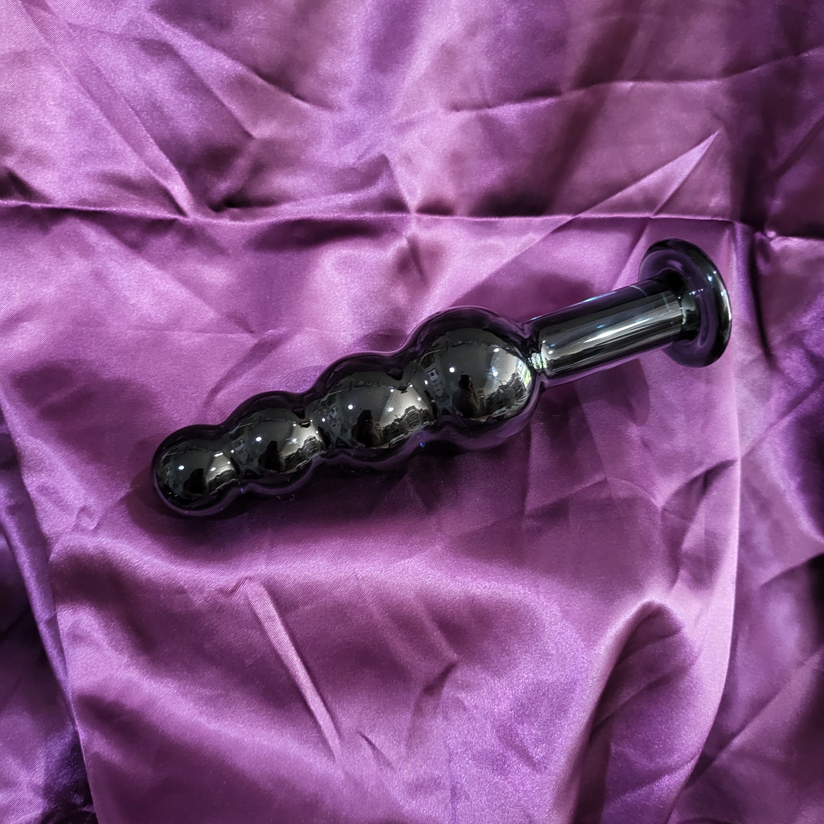 A Size Queen ~ blown glass Ornament