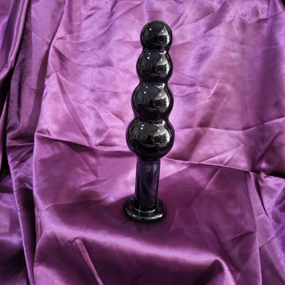 A Size Queen ~ blown glass Ornament