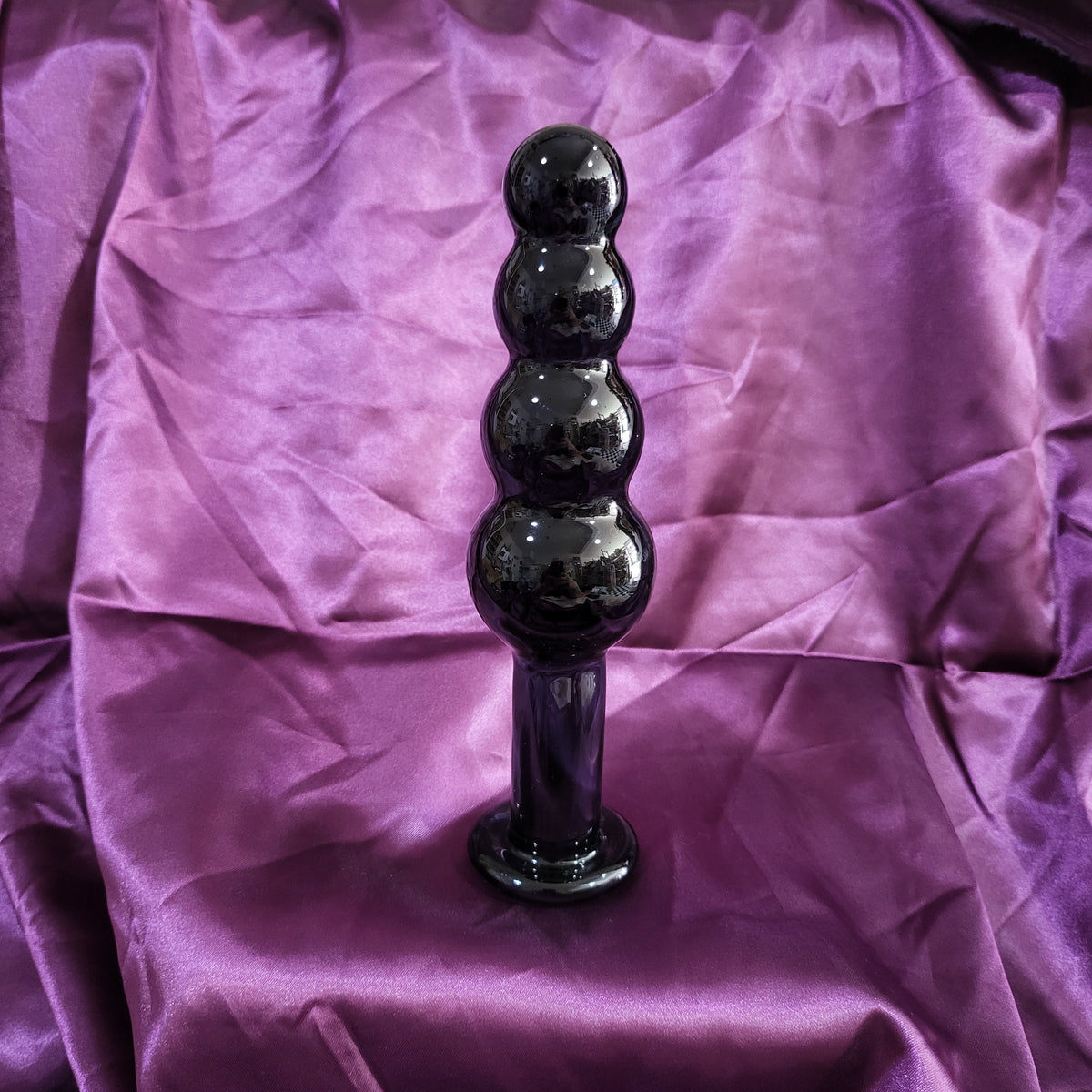 A Size Queen ~ blown glass Ornament